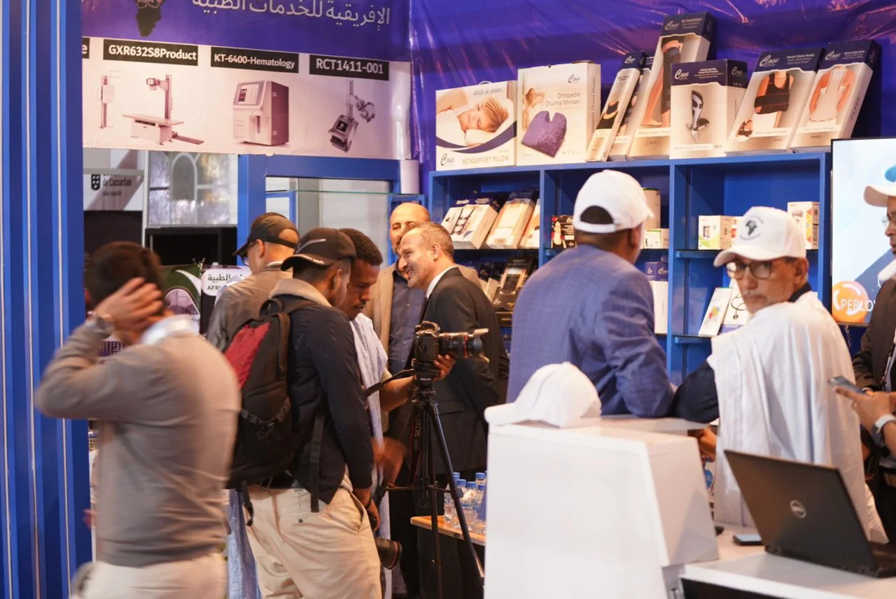Press cover an exhibitor stand on the fair floor